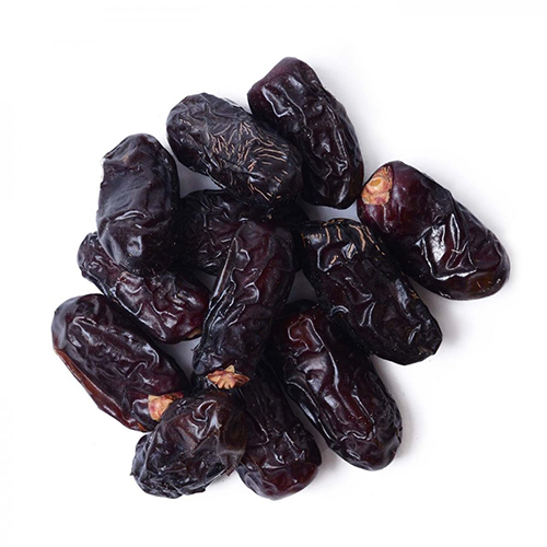 a pile of dates on a white background