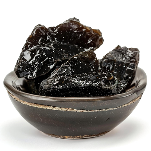 a bowl of black shilajit